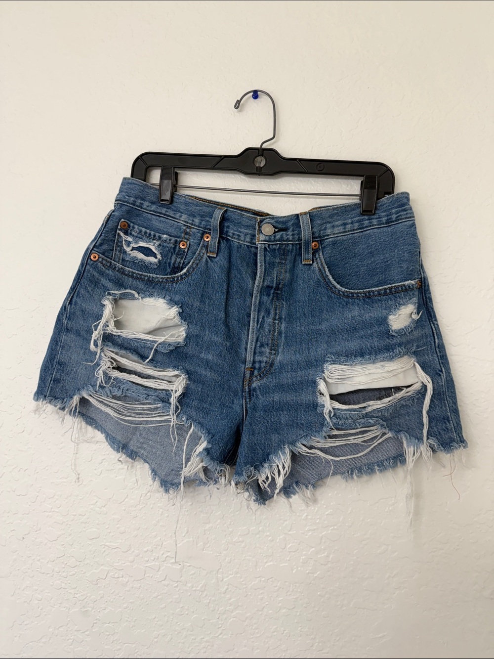 Women’s Light Blue Distressed Levi Denim Shorts